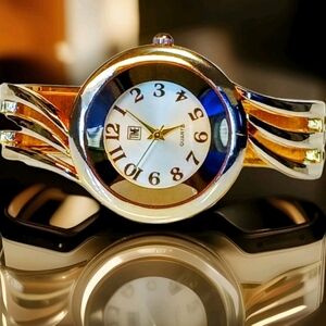 Ladies TIME Golden Wave Cuff-Watch